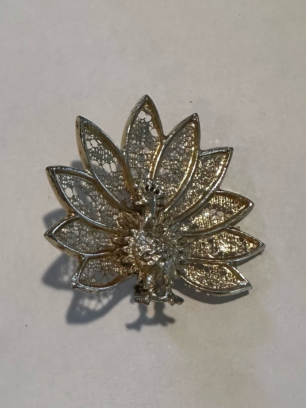 Peacock brooch